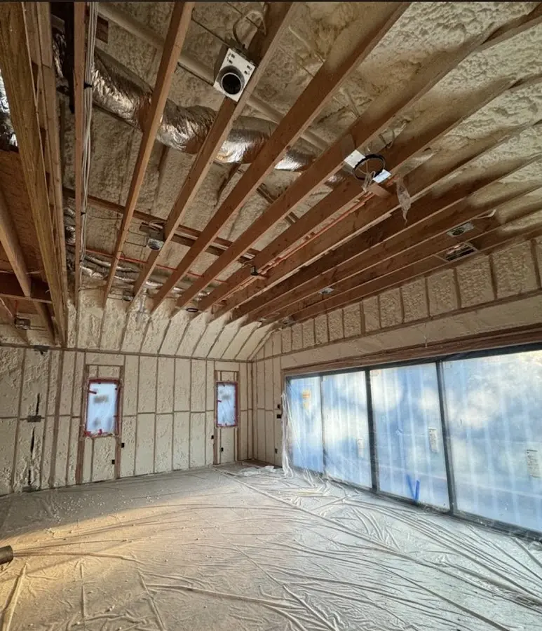Interior walls and ceiling insulated with spray foam during new construction in Eagle Lake